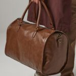 Elegante bolsa NuHide™