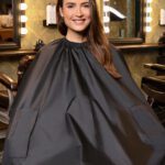 Capa peluquero de salón con empuñaduras