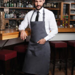 Delantal peto con bolsillo