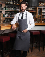 Delantal peto con bolsillo