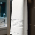 Toalla de algodón apta para hostelería VALENTO CORAL