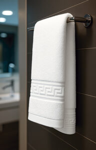 Toalla de algodón apta para hostelería VALENTO CORAL